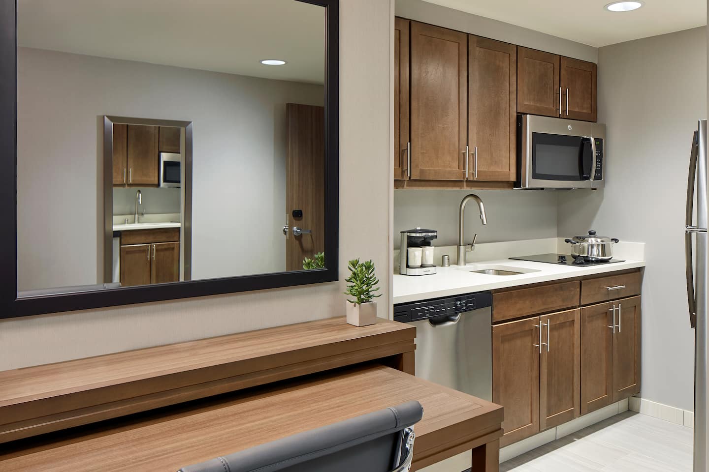Full kitchen in a studio suite at Homewood Suites by Hilton Los Angeles Redondo Beach